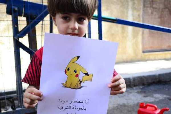 «Ελα να με σώσεις» -Παιδιά από τη Συρία ποζάρουν με χαρακτήρες του Pokemon [εικόνες]