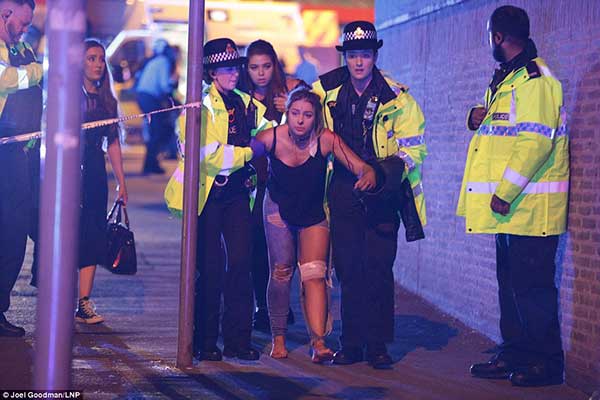 40ae2c7e00000578-4531940-bloodied concertgoers were pictured being helped by armed police-a-48 1495492948302